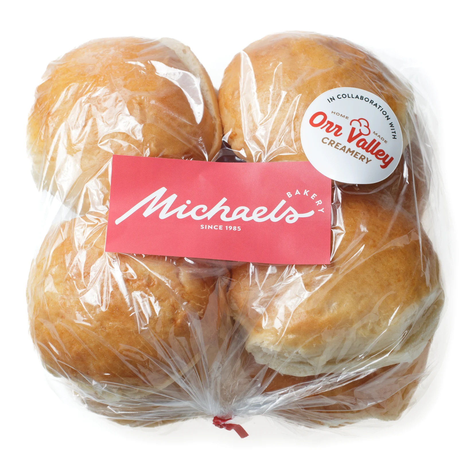 Bag of fresh-baked buns from Michaels Bakery with an Orr Valley Creamery collaboration sticker